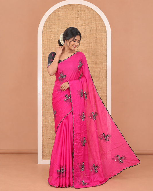 Rani Pink Rangoli Chiffon Saree, Decorated with Flower-Style Motifs Embroidered on Its Body, a Subtle Scallop Embroidered Border, a Self-Pallu, and Paired with a Contrast Embroidered Blouse