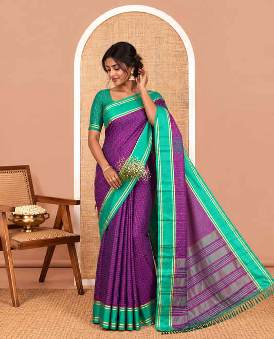 Purple Semi-Soft Silk Saree Steeped with Plus-Shaped Buttas, Contrast Border, and a Matching Blouse