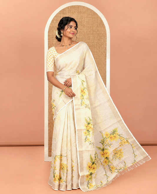 Cream Tissue Saree, Enthralled with Yellow Floral Motifs Printed All Over Its Body, Subtle Bavanji Border, Pallu Features Floral Tiara Motifs Print, and Paired with a Matching Floral Printed Blouse