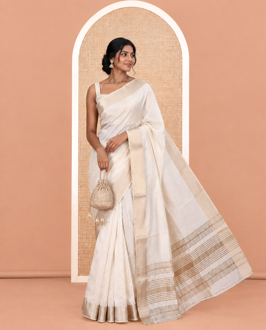 Cream Plain Semi-Tussar Saree, a Zari Border, a Self-Pallu, and a Matching Blouse