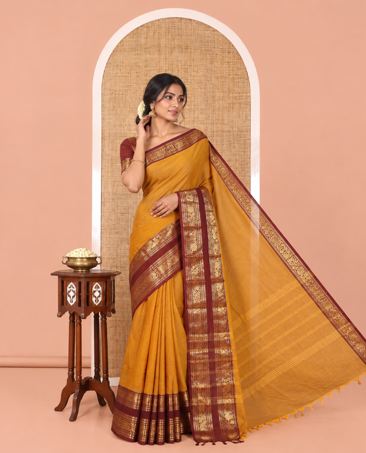 Mustard Plain Chettinad Cotton Saree, a Contrast Rettai Pettu Traditional Zari Border, Striped Pallu, and a Matching Blouse