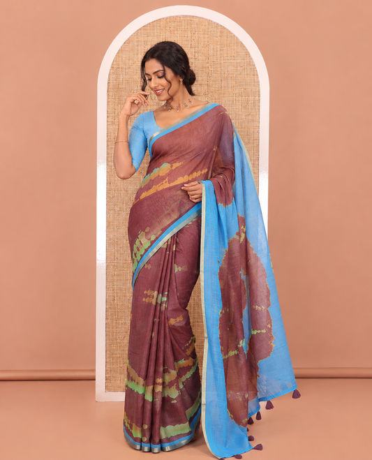 Maroon shibori printed linen cotton saree, contrast piping zari border, shibori circle printed pallu, and a contrast shibori printed blouse