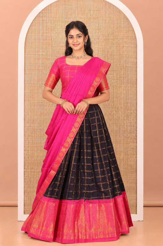 Navy Blue-Rani Pink Sungudi Cotton Half-Saree Features Checked Skirt, Contrast Gopuram Border, Contrast Blouse, and Zari-Bordered Syska Georgette Dhavani