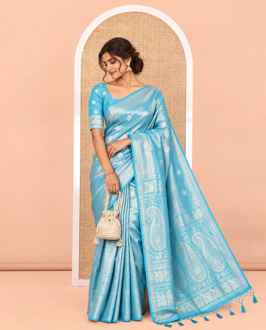 Peacock Elite Soft Silk Saree Features Jacquard Design, a Zari Border, Paisley Pallu, Matching Blouse