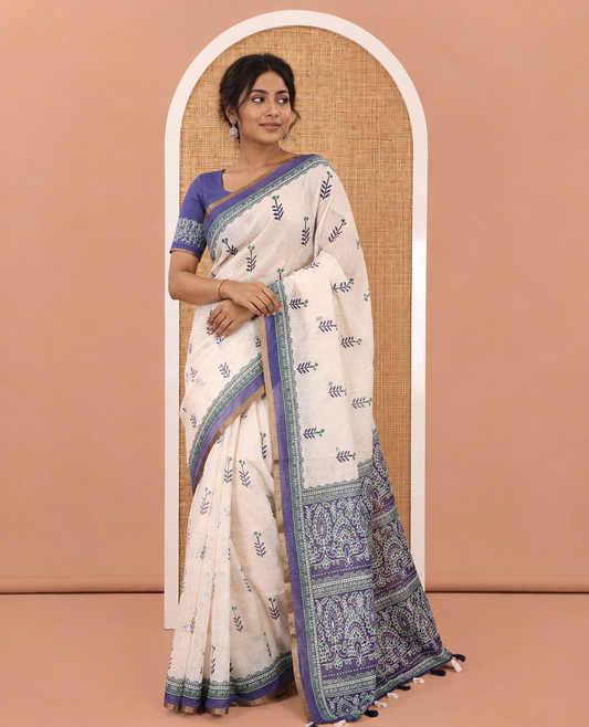 Cream-Blue Linen Cotton Saree Features Floral Buttas, Contrast Printed Border, Intricate Pallu, and a Contrast Blouse