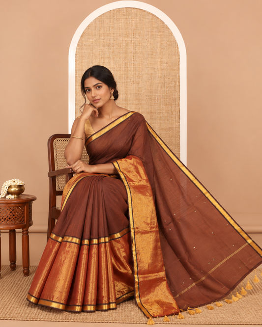 Brown Khadi Mul Cotton Saree, Gleamed Up with Sequins Work, a Golden Zari Border, Self-Pallu, and a No Blouse