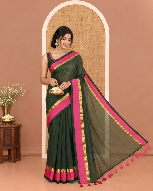 Green Plain Khadi Mul Cotton Saree, Complemented by a Contrast Pink Zari Border, Plain Pallu, and Paired with a Matching Blouse