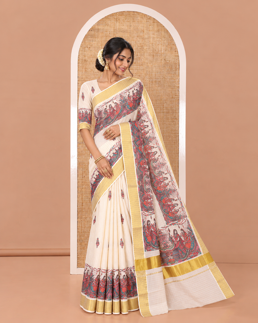 Half-White Kerala Cotton Saree, Artfully Detailed with Dancing Human Figurines Printed on Its Body, Highlighted by a Zari Border, Pallu Pictures the Same Print, and Paired with a Matching Printed Blouse
