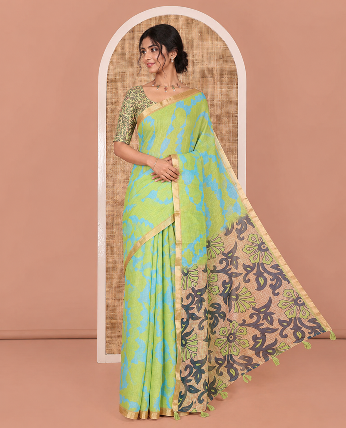 Parrot Green Linen Cotton Saree, Adorned with Shibori Print On Its Body, Subtle Piping Border, Pallu Steeped with Floral Vine Print, and Paired with a Printed Blouse