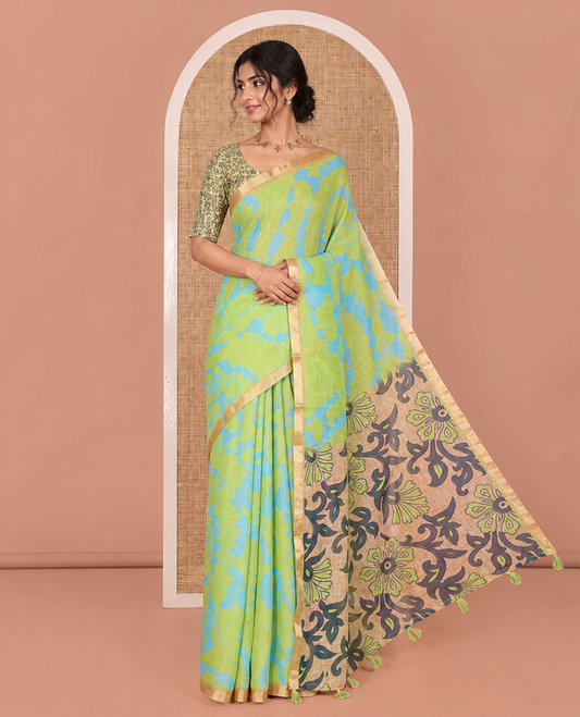 Parrot Green Linen Cotton Saree, Adorned with Shibori Print On Its Body, Subtle Piping Border, Pallu Steeped with Floral Vine Print, and Paired with a Printed Blouse