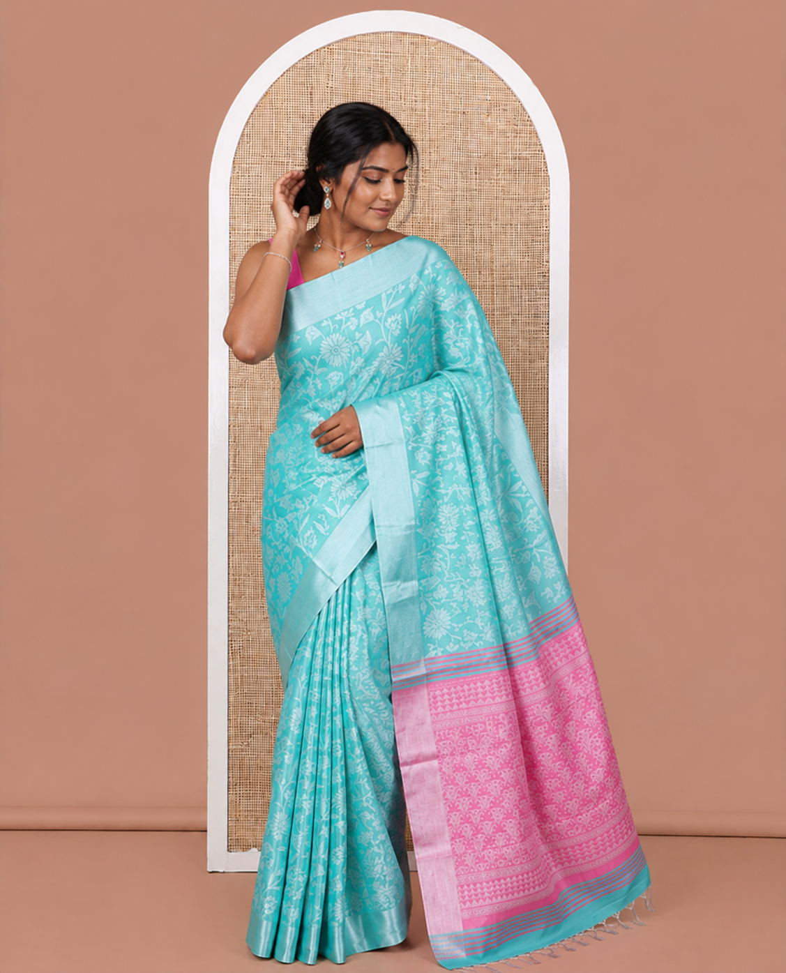 Rama Tissue Cotton Saree Features Floral Vine Design, a Zari Border, Contrast Intricate Pallu, and a Contrast Blouse