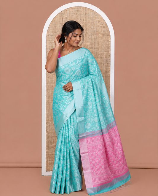 Rama Tissue Cotton Saree Features Floral Vine Design, a Zari Border, Contrast Intricate Pallu, and a Contrast Blouse