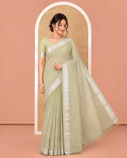 Sage Green Linen Zari Cotton Saree, Gleamed Up with Zari Stripes All Over Its Body, a Subtle Zari Border, a Self-Pallu, and Comes Without a Blouse