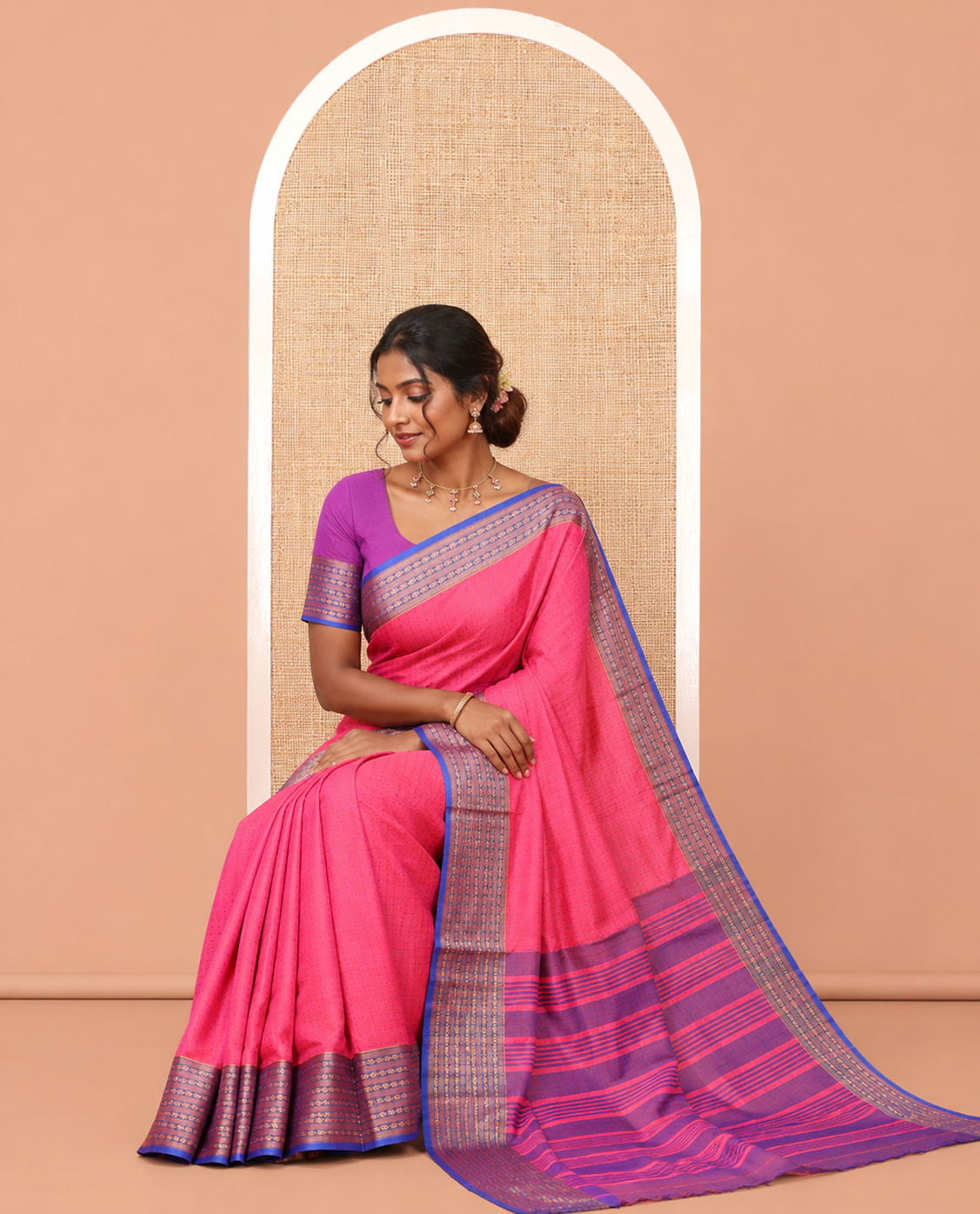 Pink Semi-Soft Silk Saree, Elevated with Plus-Shaped Buttas, Complemented by a Contrast Border, Striped Pallu, and a Contrast Blouse