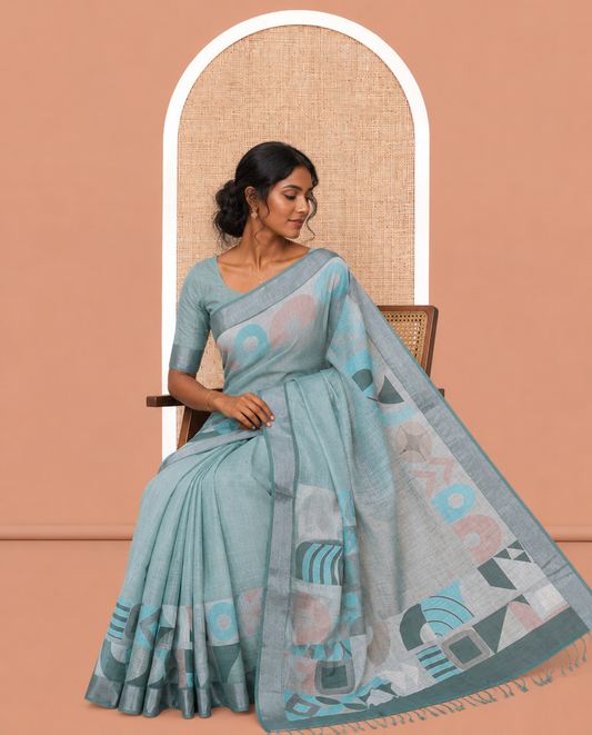 Pista Green Plain Linen Cotton Saree, Complemented by Geometric Printed Zari Border, and a Matching Blouse