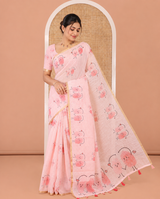 Peach Linen Cotton Saree, Creatively Printed with Thumb Finger Printed Cartoon-Theme Print on Its Body, a Subtle Piping Border, a Self-Printed Pallu, and Paired with a Matching Blouse