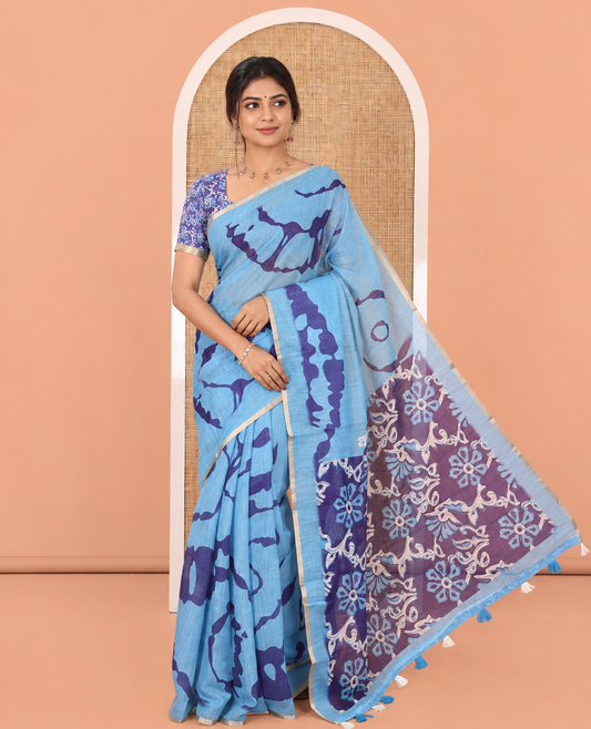 Blue Linen Cotton Saree, Adorned with Shibori Print, Gold Piping Border, Contrast Floral Printed Pallu, and Contrast Floral Printed Blouse