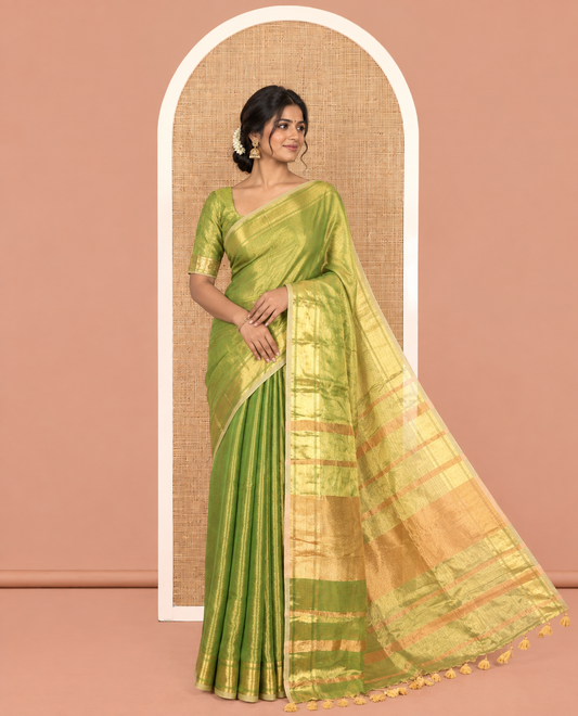 Green Plain Khadi Tissue Saree, a Gleaming Zari Bavanji Border, Golden Zari Striped Pallu, and Paired with a Matching Blouse