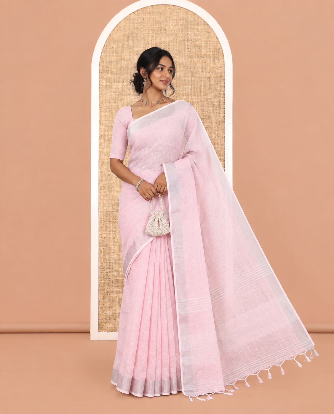 Baby Pink Plain Linen-Cotton Saree, a Zari Border, Striped Pallu, and a Matching Blouse