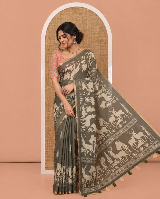 Green Christmas-Themed Linen Cotton Saree, a Subtle Piping Border, a Christmas-Themed Print Pallu, a Contrast Blouse