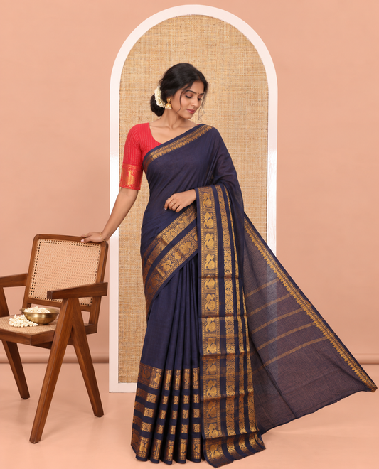 Navy Blue Plain Sungudi Cotton Saree, Highlighted by Traditional Zari Border of Peacock and Floral Creeper Designs, Subtly Striped Pallu, and Paired with a Contrast Blouse