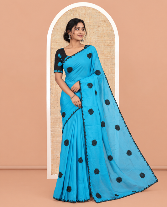 Blue Chiffon Saree, Gracefully Embellished with Floral Embroidery Buttas, a Lace Embroidered Border, a Contrast Blouse