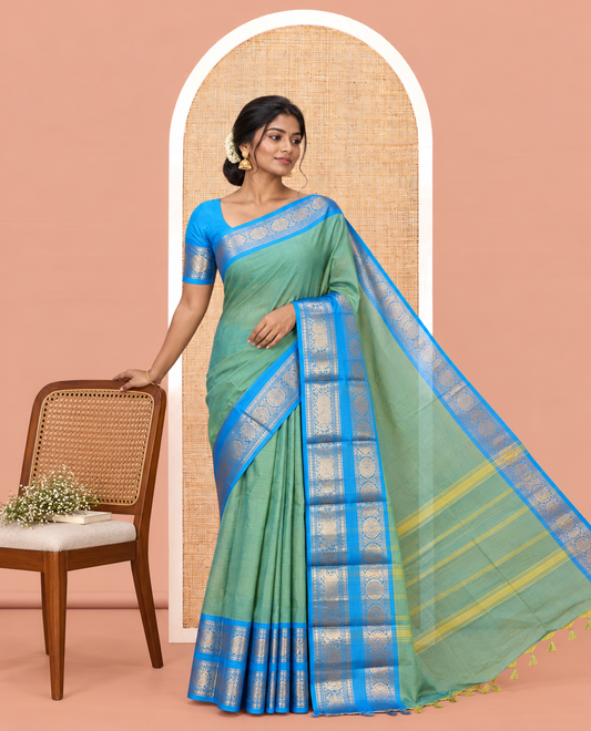 Sea Green Plain Chettinad Cotton Saree, Complemented by a Contrast Traditional Zari Rettai Pettu Border, and a Matching Blouse