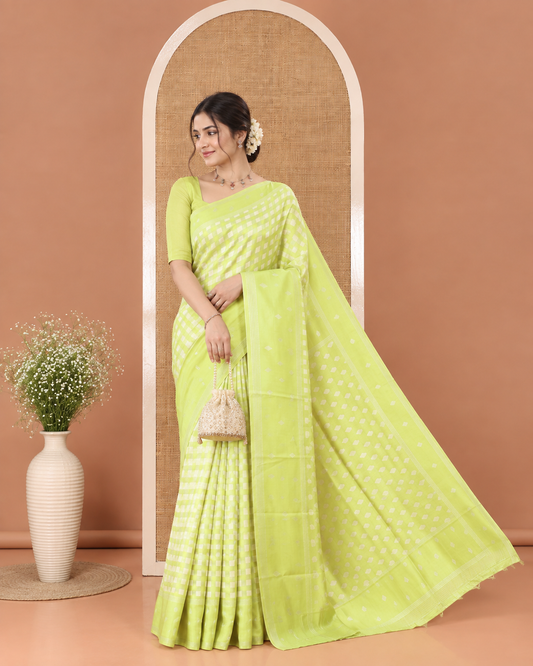 Green Kanchi Silk Saree, Accentuated with Checked Design on Its Body, Highlighted by a Self-Border of Diamond Patterns, Pallu Steeped with Buttas, and Paired with a Matching Blouse