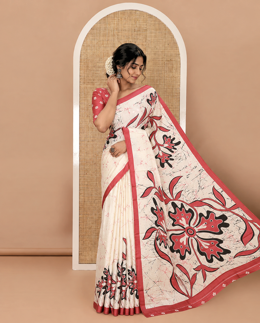 Cream-base batik-style floral printed satin crepe saree, contrast onion pink border, printed pallu & contrast floral printed blouse