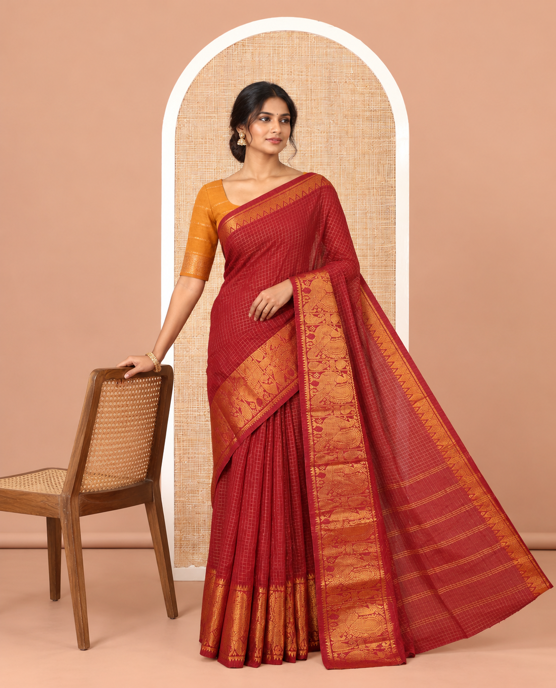 Maroon Checked Sungudi Cotton Saree, a Traditional Paisley-Peacock Zari Border, Self-Pallu, and a Contrast Blouse