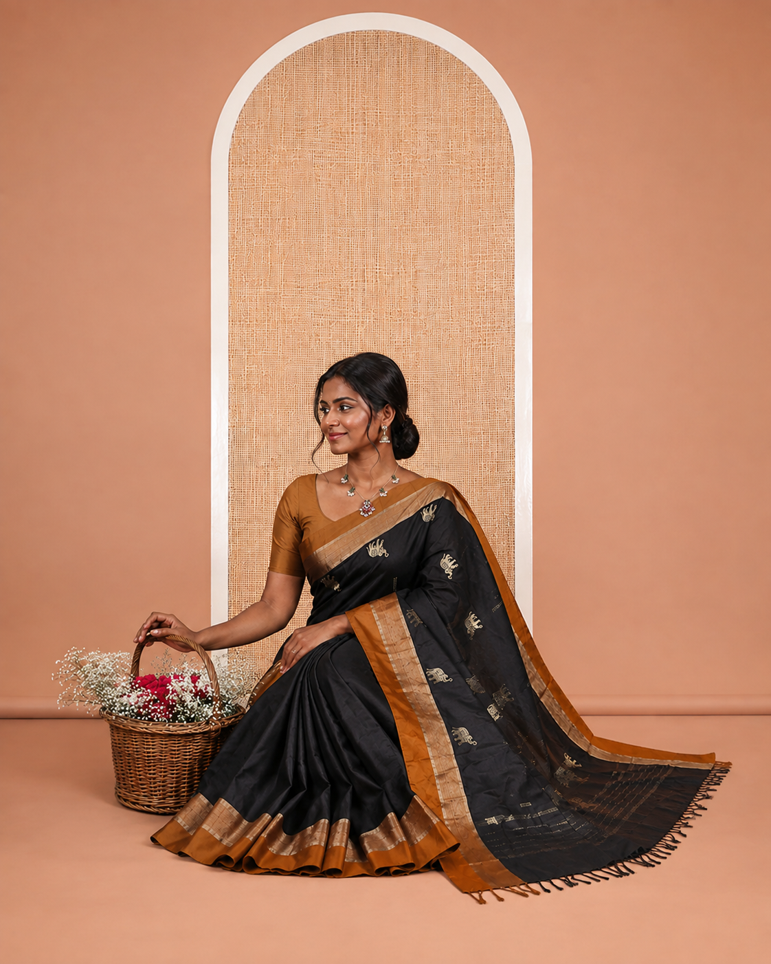 Black Semi-Soft Silk Saree Features Dobby and Elephant Buttas, a Contrast Border, and Matching Blouse