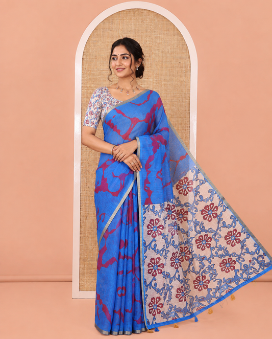 Royal Blue Linen Cotton Saree, Bedecked with Shibori Printed on Its Body, Subtle Piping Border, Pallu of Floral Vine Print, and Paired with a Contrast Floral Vine Printed Blouse