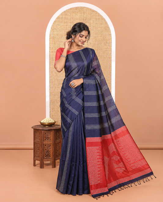 Borderless Navy Blue Semi-Raw Silk Saree Featuring Elegant Vertical Sequin Stripes Running Across the Body, Complemented by a Contrast Thread-Work Pallu and Paired with a Contrast Blouse