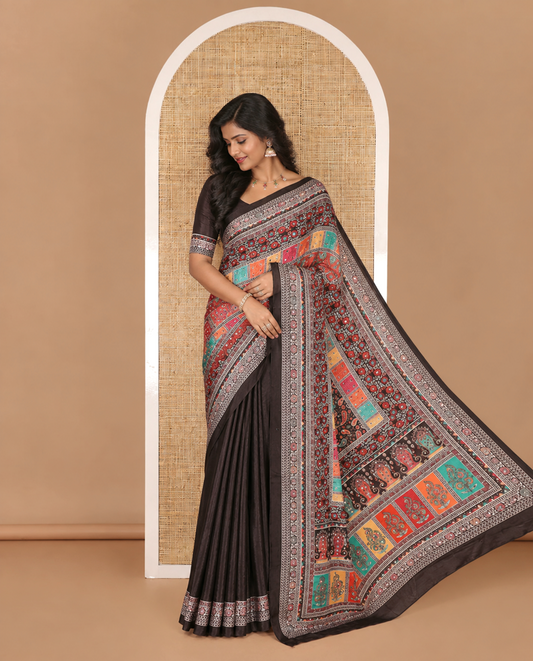 Black kaleidoscopic colored floral-geometric printed with mirrorwork masakali saree, printed border, print with mirror work pallu, and a matching blouse