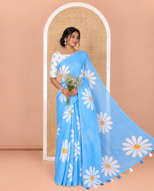 Borderless Blue Linen Saree Beautified with Big Daisy Flower Motifs Printed All Over the Body and Pallu, Complemented by a Contrast Blouse Printed with Daisy Flower Motifs
