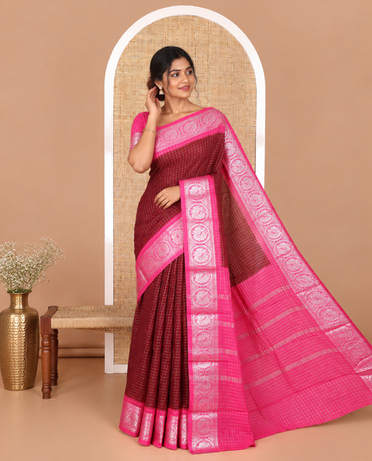Maroon and pink checked sungudi cotton saree, contrast silver zari round peacock border, striped pallu, and a contrast checked blouse