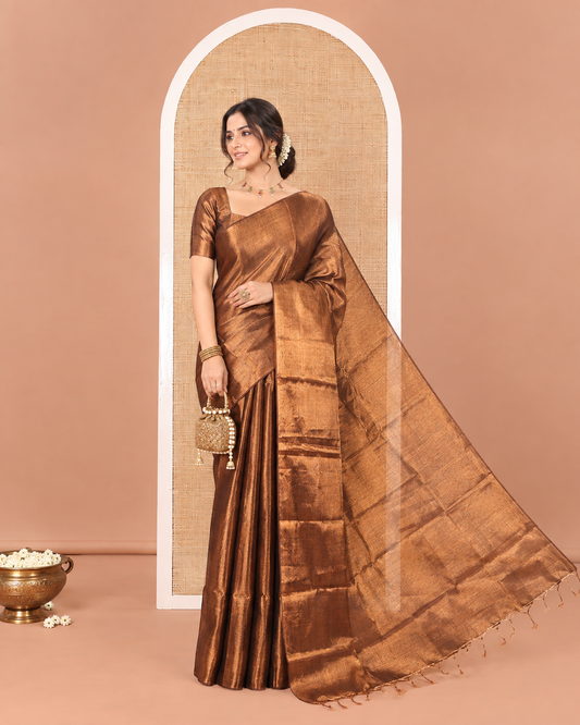 Borderless Copper Plain Khadi Tissue Saree, a Self-Pallu, and Paired with a Matching Blouse
