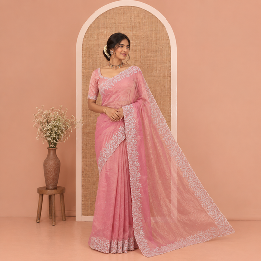 Dusky Pink Twill Net Saree, Elevated with Stone Work, Highlighted by a Scallop Embroidered Border, and Paired with a Matching Blouse