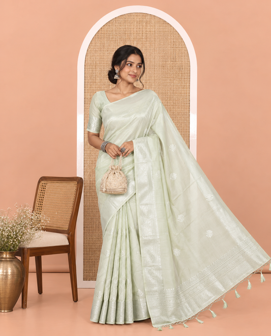 Liril Green Elite Soft Silk Saree, Subtly Sparkled with Ogee Jacquard Design, a Traditional Zari Border, Zari Pallu, and a Matching Blouse