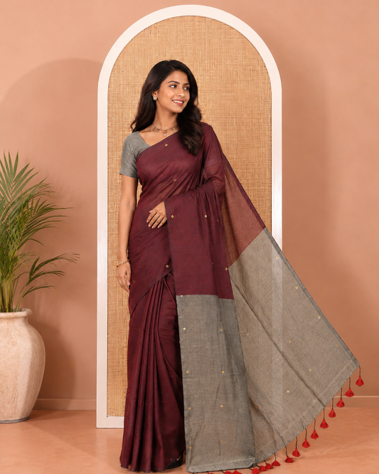 Borderless Maroon Khadi Mul Cotton Saree, Adorned with Sequins Work All Over Its Body, Complemented by Contrast Pallu of Sequins Work and Paired with a Contrast Blouse
