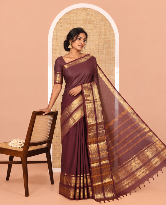 Coffee Brown Plain Chettinad Cotton Saree, Highlighted by Rettai Pettu Peacock-Elephant Border, a Matching Blouse