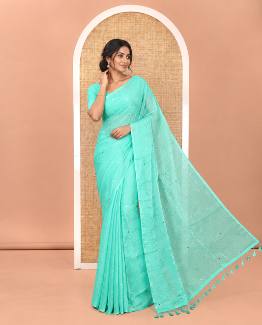 Borderless Turquoise Fendy Chiffon Saree, Gleamed Up with Sequin Work on Its Body, Highlighted by a Self-Pallu of Sequin Work, and Paired with a Matching Blouse