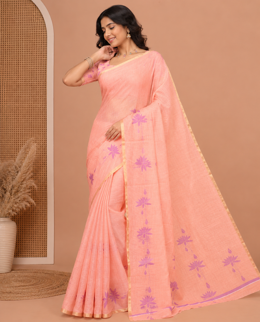 Borderless Peach Linen Cotton Saree Features Lotus Print, a Self-Pallu, and a Matching Blouse