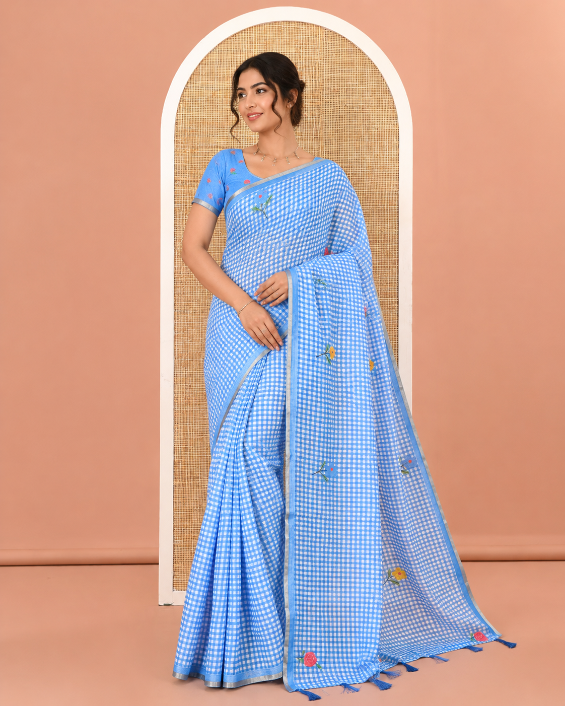 Blue Linen Cotton Saree, Decorated with Micro-Checks and Floral Motifs on Its Body, Subtle Piping Border, a Self-Pallu, and Paired with a Rose Floral Printed Blouse