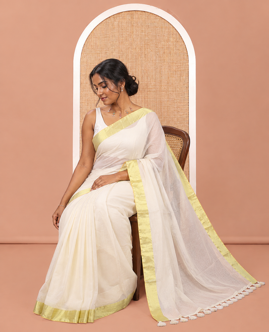 Cream Plain Khadi Mul Cotton Saree, a Gleaming Gold Zari Border, a Self-Pallu, and No Blouse