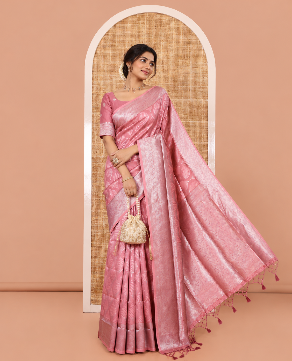 Onion Pink Elite Soft Silk Saree, Subtly Sparkled with Ogee Jacquard Design, a Traditional Zari Border, Zari Pallu, and a Matching Blouse