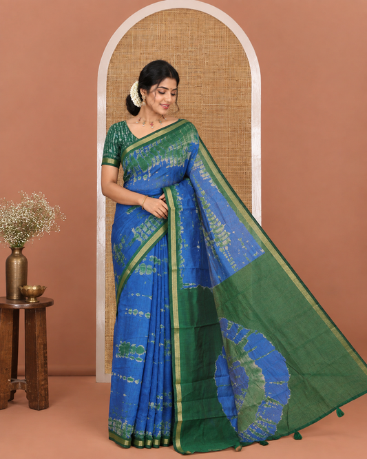 Blue Muslin Cotton Saree, Adorned with Marble-Textured Shibori Printed All Over Its Body, Subtle Piping Border, Pallu of Shibori Print, and Paired with a Contrast Blouse