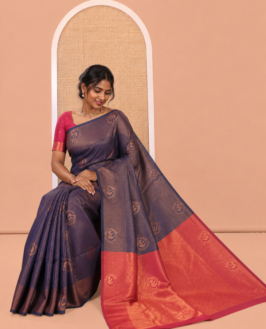 Navy Blue Art Kanchi Silk Saree, Adorned with Vaira Oosi and Zari Buttas, a Traditional Zari Border, Contrast Jaal Pallu, and a Contrast Blouse