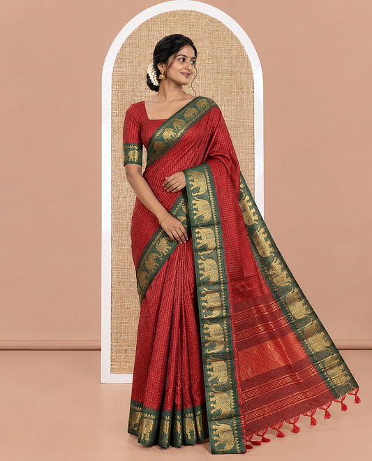 Red Semi-Taffeta Saree, Enthralled with Medium-Zari Checks All Over Its Body, Complemented by Contrast Temple Border Featuring Elephant Motifs, Contrast Checked Pallu, and Paired with a Matching Blouse