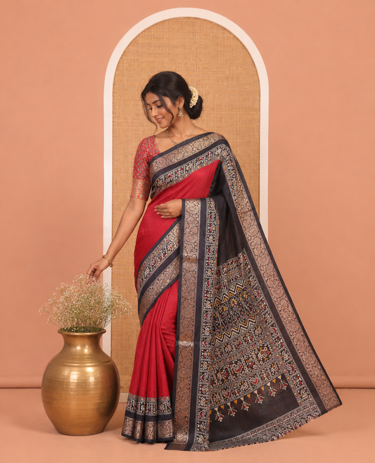 Maroon Embossed Moss Chiffon Saree, Complemented by a Contrast Traditional Zari Patola Printed Border, Patola Pallu, and a Contrast Blouse